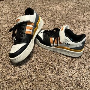 Adidas Black and White Shoes with Gold Highlights